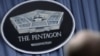 U.S. -- Pentagon Press Secretary Rear Admiral John Kirby responds to a question from the news media about the shooting down of Malaysia Airlines Flight 17 during a press conference at the Pentagon in Arlington, July 18, 2014